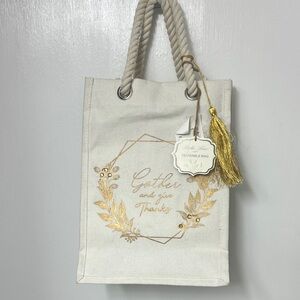 Cream colored canvas reusable bag, “Gather and give Thanks” written on side NWT